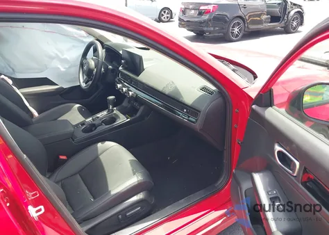 2023 Honda Civic Touring z USA, uszkodzony, nr VIN 2HGFE1F94PH323451